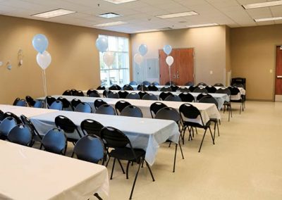 Tables and chairs set up for baby shower in Trevino Hall